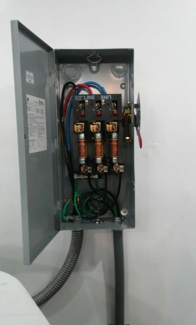 Three-phase disconnect switch installed for Smoke Detector Installation in Wellesley