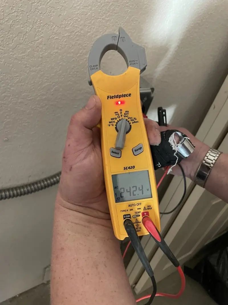 Voltage testing with clamp meter during Circuit Breaker Repair in Wellesley